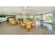 Community room with tables, chairs, and a ping pong table at 4580 Overlook Ne Dr # 297, St Petersburg, FL 33703