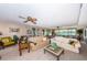 Relaxing community room with couches, a coffee table, and a bookcase at 4580 Overlook Ne Dr # 297, St Petersburg, FL 33703