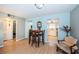 Condo dining area with wood floors and view of kitchen at 4580 Overlook Ne Dr # 297, St Petersburg, FL 33703