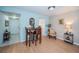 Condo dining area with wood floors and small table at 4580 Overlook Ne Dr # 297, St Petersburg, FL 33703