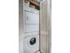 Convenient laundry closet with stacked washer and dryer at 4580 Overlook Ne Dr # 297, St Petersburg, FL 33703