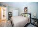 Spacious main bedroom with king bed, ample closet space, and adjacent bathroom at 4580 Overlook Ne Dr # 297, St Petersburg, FL 33703