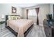 Comfortable main bedroom with a king-size bed and built-in wardrobe at 4580 Overlook Ne Dr # 297, St Petersburg, FL 33703