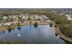 Aerial view of house by lake at 12038 Steppingstone Blvd, Tampa, FL 33635