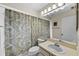 Bathroom with updated vanity and shower at 12038 Steppingstone Blvd, Tampa, FL 33635