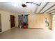 Organized garage with storage cabinets and wall organizers at 12038 Steppingstone Blvd, Tampa, FL 33635