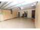 Garage featuring ample storage and epoxy flooring at 12038 Steppingstone Blvd, Tampa, FL 33635