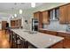 Modern kitchen featuring granite countertops and custom cabinetry at 12038 Steppingstone Blvd, Tampa, FL 33635