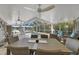 Spacious covered patio with pool and lake view at 12038 Steppingstone Blvd, Tampa, FL 33635