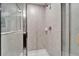 Modern bathroom shower with clear glass doors and sleek tile design at 724 Royal Empress Dr, Ruskin, FL 33570