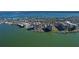 Aerial view of waterfront community with multiple buildings at 736 Island Way # 606, Clearwater Beach, FL 33767
