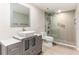 Bathroom with floating vanity, modern sink, and glass shower at 736 Island Way # 606, Clearwater Beach, FL 33767