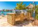 Dual stainless steel grills with stone facade, located by waterfront at 736 Island Way # 606, Clearwater Beach, FL 33767