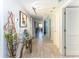 Hallway with glass-top console table at 736 Island Way # 606, Clearwater Beach, FL 33767