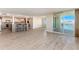 Open concept kitchen with island and water views at 736 Island Way # 606, Clearwater Beach, FL 33767