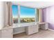 Home office with built-in desk, granite countertop, and water views at 736 Island Way # 606, Clearwater Beach, FL 33767