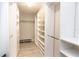 Large walk-in closet with ample shelving and hanging space at 736 Island Way # 606, Clearwater Beach, FL 33767