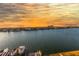 Stunning sunset view over the water, showcasing waterfront property and boats at 736 Island Way # 606, Clearwater Beach, FL 33767