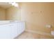 Clean bathroom with double vanity and white cabinets at 924 Bunker View Dr, Apollo Beach, FL 33572