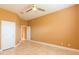 Well-lit bedroom with tile flooring and ceiling fan at 924 Bunker View Dr, Apollo Beach, FL 33572
