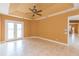 Bright bonus room with tile floors and French doors at 924 Bunker View Dr, Apollo Beach, FL 33572