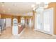 Kitchen with granite island and access to Gathering room at 924 Bunker View Dr, Apollo Beach, FL 33572