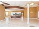 Open kitchen with island, granite countertops, and stainless steel appliances at 924 Bunker View Dr, Apollo Beach, FL 33572