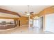 Open kitchen with granite countertops and white cabinets at 924 Bunker View Dr, Apollo Beach, FL 33572