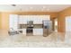 Spacious kitchen with stainless steel appliances and granite countertops at 924 Bunker View Dr, Apollo Beach, FL 33572