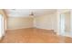 Large living area with hardwood floors, ceiling fan, and access to bathroom at 924 Bunker View Dr, Apollo Beach, FL 33572