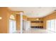 Living room with tile floors, two ceiling fans, and an open floor plan at 924 Bunker View Dr, Apollo Beach, FL 33572