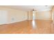 Bright living room with hardwood floors and ceiling fan at 924 Bunker View Dr, Apollo Beach, FL 33572