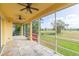 Relaxing screened porch overlooking a golf course at 924 Bunker View Dr, Apollo Beach, FL 33572