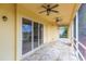 Large screened porch with sliding glass doors and tranquil views at 924 Bunker View Dr, Apollo Beach, FL 33572