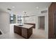 Modern kitchen with island, stainless steel appliances, and ample cabinetry at 301 1St S St # 205, St Petersburg, FL 33701