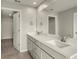 Double vanity bathroom with modern fixtures at 31472 Woodland Race Loop, Wesley Chapel, FL 33545