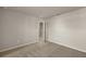 Bedroom with carpet, neutral walls, and closet at 31472 Woodland Race Loop, Wesley Chapel, FL 33545