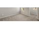 Spacious bedroom with carpet and window at 31472 Woodland Race Loop, Wesley Chapel, FL 33545