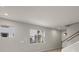 Bright and airy living room with neutral walls and tile flooring at 31472 Woodland Race Loop, Wesley Chapel, FL 33545