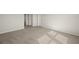 Bright bedroom with neutral walls and carpeted floor at 31496 Woodland Race Loop, Wesley Chapel, FL 33545