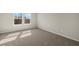 Well-lit bedroom with ample space and neutral color scheme at 31496 Woodland Race Loop, Wesley Chapel, FL 33545