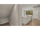 Modern kitchen with island and pantry at 31496 Woodland Race Loop, Wesley Chapel, FL 33545