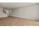 Spacious living room with wood-look tile flooring at 31496 Woodland Race Loop, Wesley Chapel, FL 33545