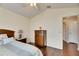 Bedroom with double doors to the closet and ensuite bath at 31935 Brookstone Dr, Wesley Chapel, FL 33545