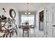 Charming dining area with table and chairs, near kitchen at 31935 Brookstone Dr, Wesley Chapel, FL 33545