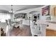 Open kitchen with a breakfast bar, light countertops, and hardwood floors at 31935 Brookstone Dr, Wesley Chapel, FL 33545