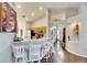 Kitchen with breakfast bar, wood cabinets, and hardwood floors at 31935 Brookstone Dr, Wesley Chapel, FL 33545