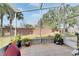 Relaxing screened patio with tiled floor, overlooking backyard at 31935 Brookstone Dr, Wesley Chapel, FL 33545