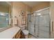 Clean bathroom with a shower/tub combo and updated vanity at 2003 Acadia Greens Dr, Sun City Center, FL 33573