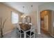 Dining room with a large table and chairs, and access to hallway at 2003 Acadia Greens Dr, Sun City Center, FL 33573